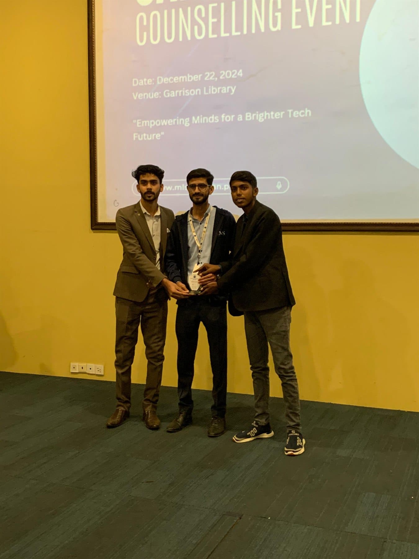 DevQuest team members receiving an award at the MLSA counselling event
