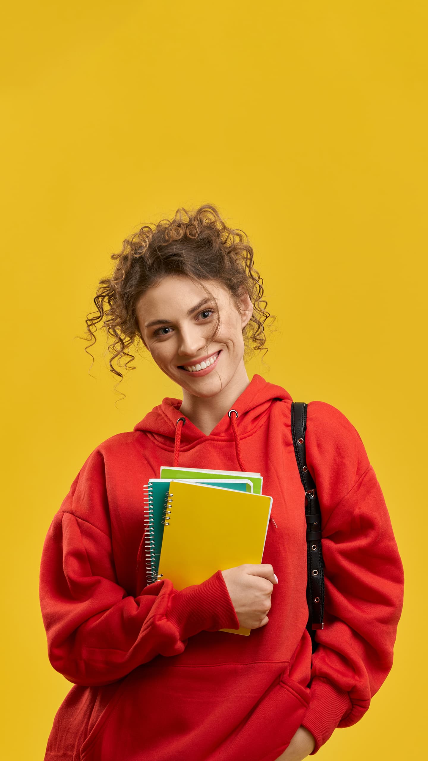 Student with notebooks